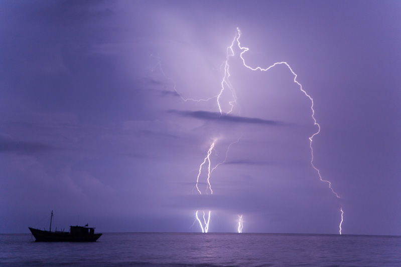 Photo A house in the abandoned town of Armero, which  was buried by a landslide in 1985 when the snow cone of erupting volcano Nevado Ruiz melted. Right, lightning strikes over the Caribbean seen from Capurganá on the border with Panamá. 