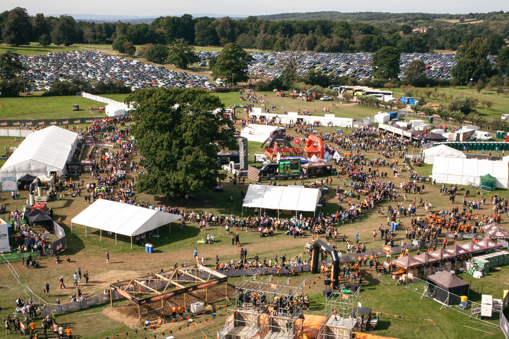 Photo Aerial views of the family farm. Tough Mudder event crowds.