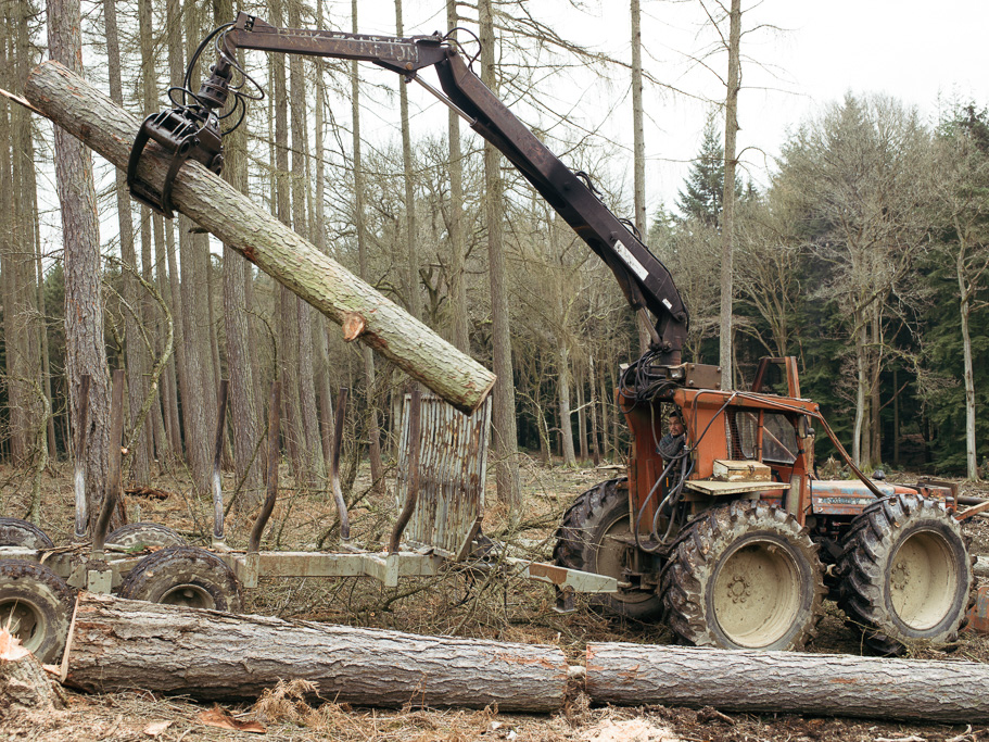 Photo Anatomy of an English country estate. Ady Burdfield driving his forwarding trailer.